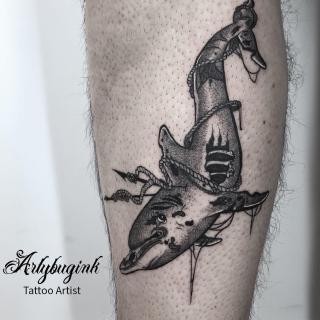 Wounded dolphin tattoo by Artybugink