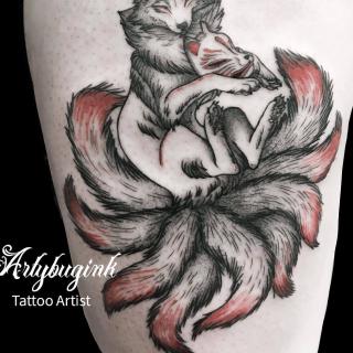 Nine tail fox with a mask tattoo by Artybugink